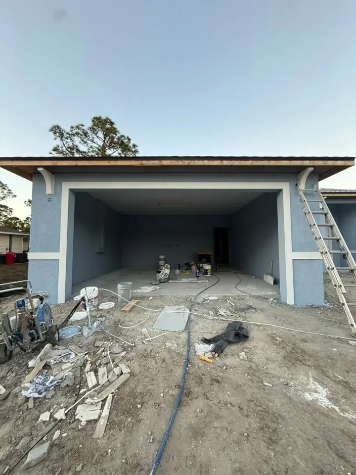 New home with painted garage and trim